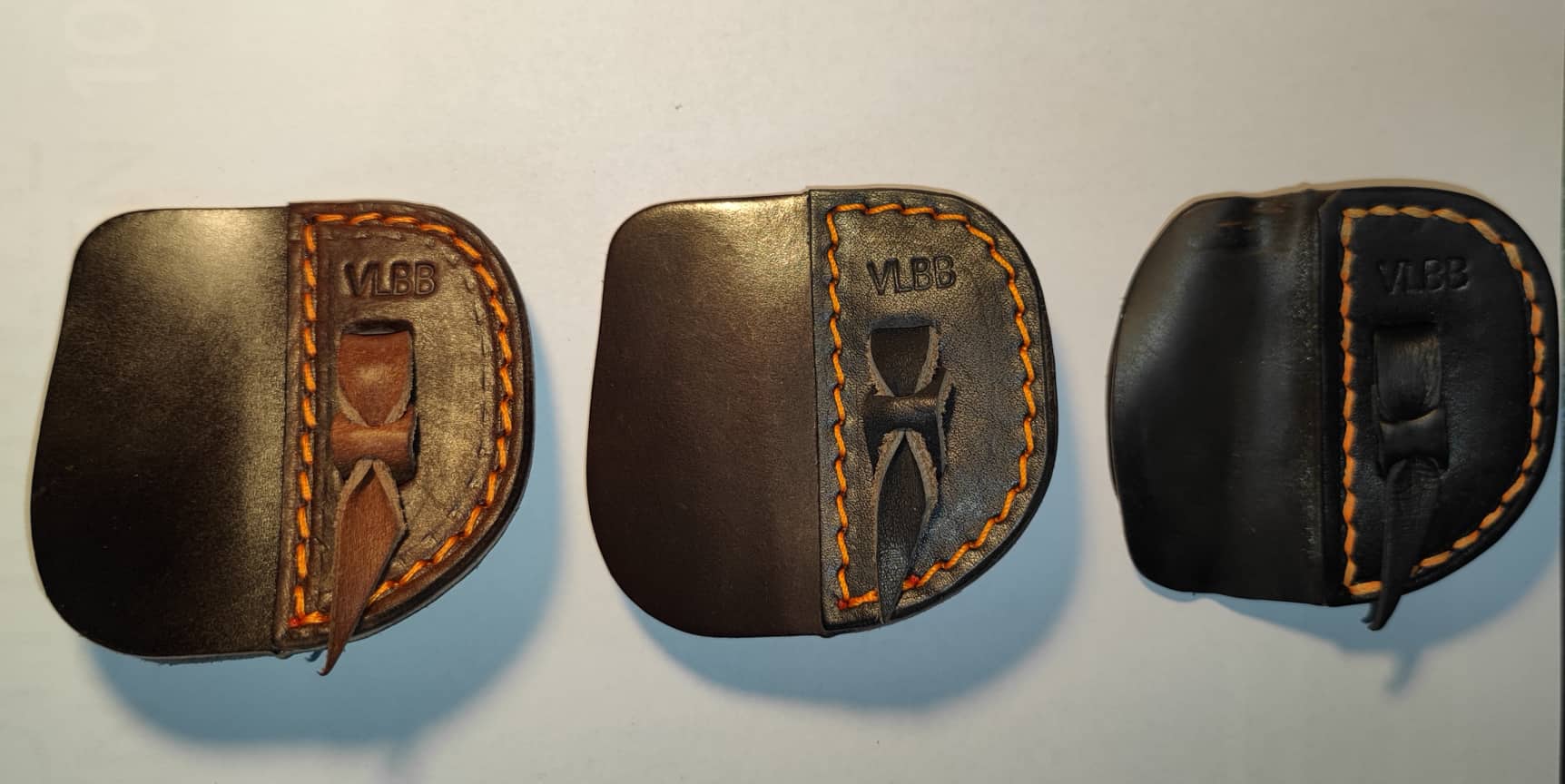 Three tabs in different states of wear
