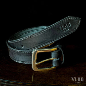 Leather belt combining stitching and rivets