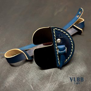 Split-finger archery tab, black Ogawa cordovan face with a blue leather stiffener and natural braid stitching